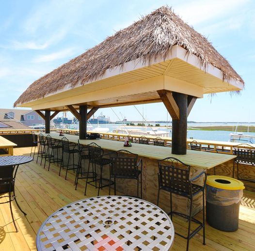Image of the outdoor bar and seating area at Sanitary Fish Market, the best seafood restaurant in Morehead City, NC.